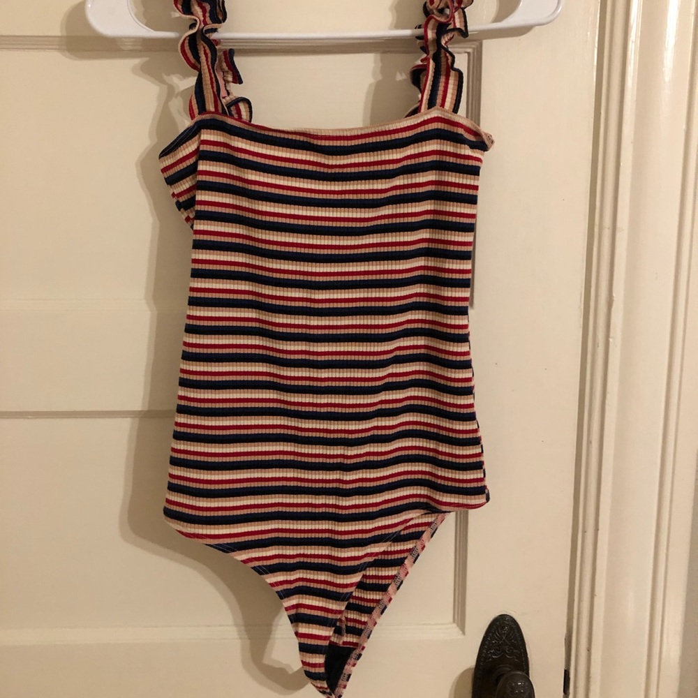 Bodysuit with colorful stripes and fun frilly straps!